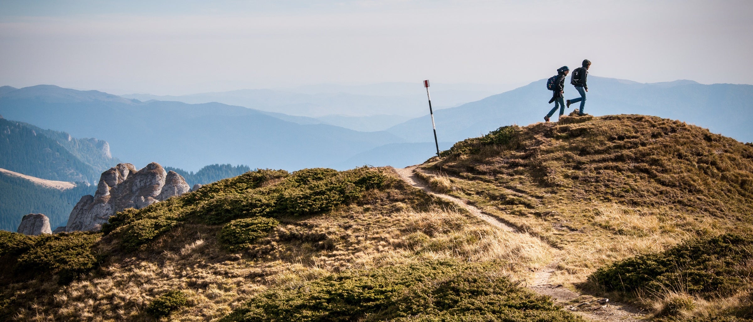 People Walking on Hill